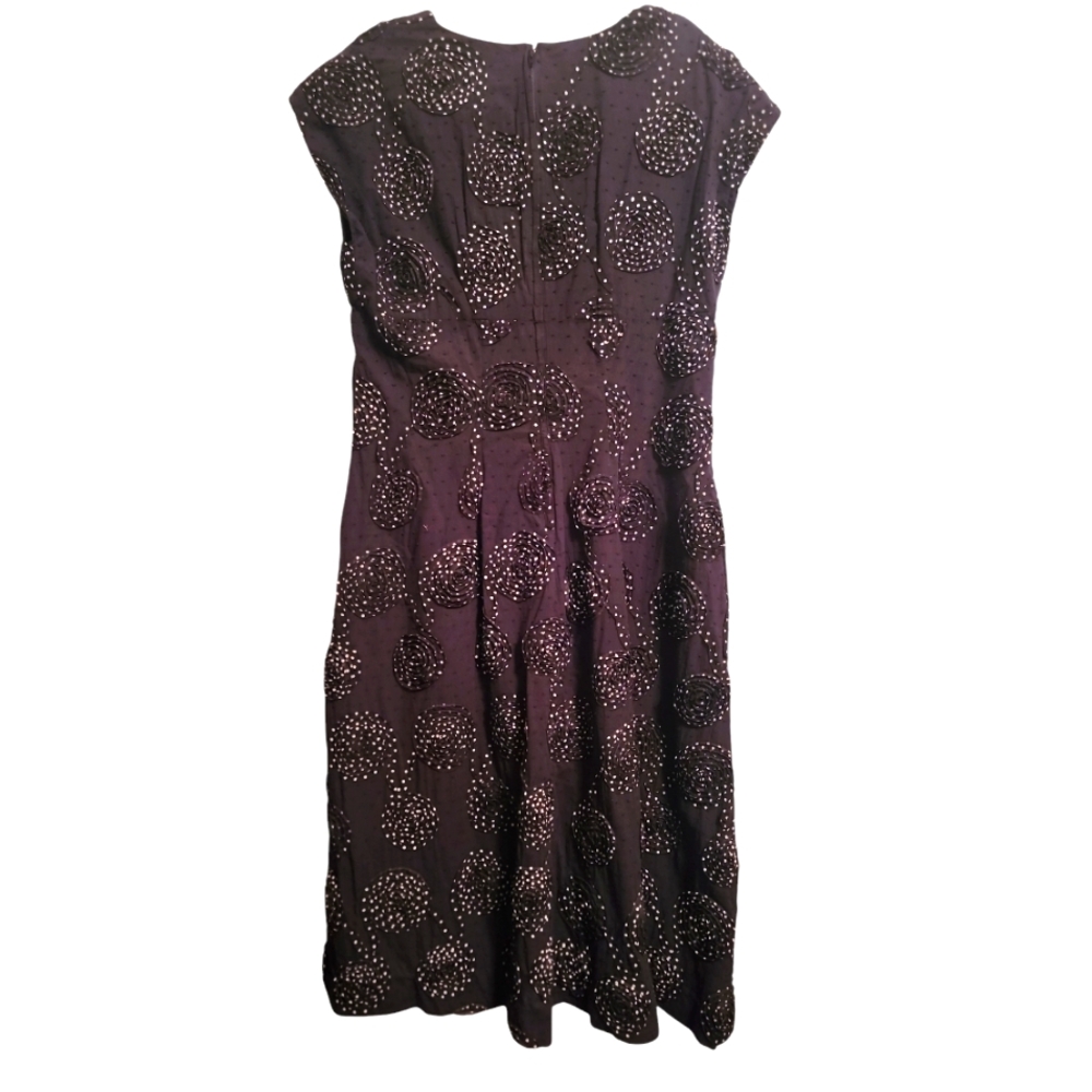 Elegant Black Pocket Dress with Raised Polka Dot Rosettes